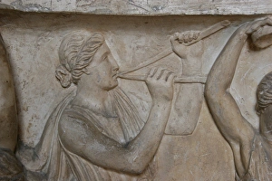 Roman Art. Woman Playing double flute Roman Art. Woman Playing double flute