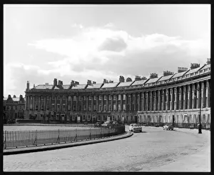 Prints of The Royal Crescent in Bath was designed by John Wood II and built between 1767 an 1775. It is comprised of 30 houses, and is shaped like a half- Colosseum, with Ionic columns John Wood Prints: Print of Royal Crescent Bath, 1767-1775