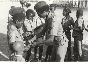 Scout leader with boys, Gambia, West Africa Scout leader with boys, Gambia, West Africa