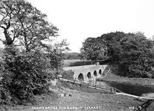 Prints of Shaws Bridge and River Lagan, Belfast - a view of the bridge with girls in the foreground.. (Location: Northern Ireland: County Antrim: Belfast). Date: circa early 1900s River Prints: Early 1900s Belfast Print: Shaws Bridge and River Lagan