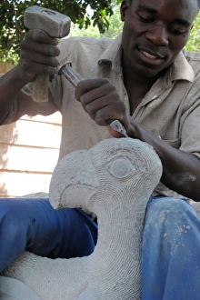 Shona Sculpture - sculptor working on sculpture Shona Sculpture - sculptor working on sculpture