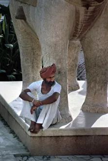 Sitting on a statue of an elephant, Jaipur, Rajasthan, India Sitting on a statue of an elephant, Jaipur, Rajasthan, India