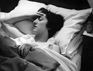Young Woman With Headache Prints: Sleepless Night