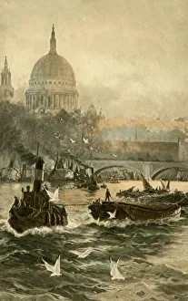 A small tugboat pulling a number of Thames River Barges A small tugboat pulling a number of Thames River Barges