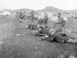 Prints of A group of men doing target practice on a shooting range before the outbreak of the First World War. Their success or otherwise is written up on various blackboards Weapons And Artillery Prints: Home Defence Target Practice Print, Pre-First World War