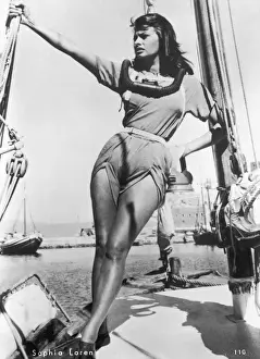 Prints of SOPHIA LOREN Italian film actress, seen here in Amazonian pose on board a ship Actors And Actress Prints: Sophia Loren Print - Italian Film Actress on Ship