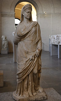 Statue of a woman, holding ears of corn and poppis. About 11 Statue of a woman, holding ears of corn and poppis. About 11