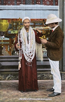 Sudanese street curio seller - Port Said, Egypt Sudanese street curio seller - Port Said, Egypt