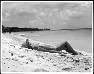 Woman In Bikini Prints: Sunbathing on Sand