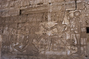 Temple of Ramses III. Pharaoh between Amun and Ptah. Egypt Temple of Ramses III. Pharaoh between Amun and Ptah. Egypt