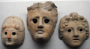 Theatrical masks made in terracotta. Ukraine Theatrical masks made in terracotta. Ukraine