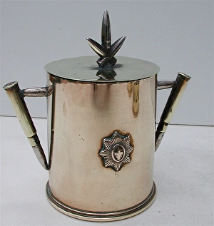 Tobacco jar made from the base section of a brass shell Tobacco jar made from the base section of a brass shell
