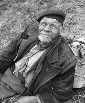 Tramp sitting on grass, Balham, SW London Tramp sitting on grass, Balham, SW London