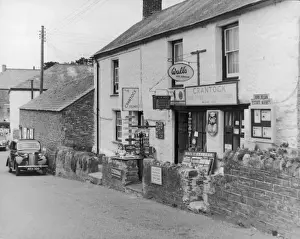 Prints of The Crantock Stores, near Newquay, Cornwall; selling Walls ice cream, newspapers, postcards and incorporating the village post office Crantock Prints: Village Post Office Print, Crantock Stores near Newquay