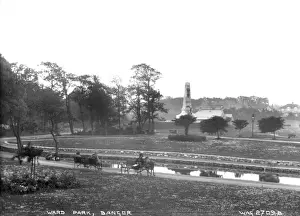 Prints of Ward Park, Bangor - a view of the Memorial with the duck pond and people sitting in the foreground. (Location: Northern Ireland; County Down; Bangor). Date: circa early 1900s Down Prints: Ward Park, Bangor Print - Early 1900s