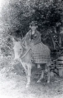 Welsh woman in traditional costume on a donkey Welsh woman in traditional costume on a donkey