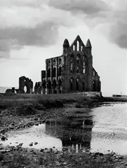 Prints of Whitby Abbey, Yorkshire, England. King Edwin built a small church here c. 630. St. Hilda founded a monastery in 656. The present ruined Norman Abbey was built circa 1222. Date: founded circa 656 Yorkshire Prints: Whitby Abbey Print, Yorkshire, England Founded circa 656