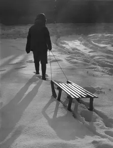 Winter Scene Prints: Vintage Print of Boy Pulling Sledge through Snow