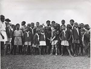 Wolf cubs watching athletics, Ghana, West Africa Wolf cubs watching athletics, Ghana, West Africa