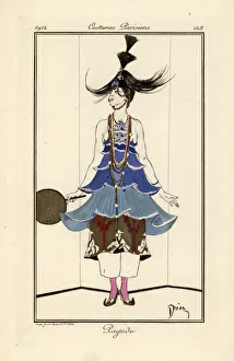 Woman in a blue pagoda dress with necklaces and pantaloons Woman in a blue pagoda dress with necklaces and pantaloons