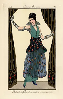 Woman in dress of taffeta and printed chiffon Woman in dress of taffeta and printed chiffon