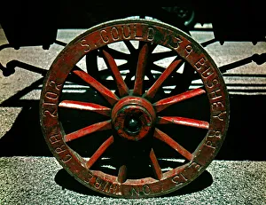 Wooden spoked wheel on market barrow, London Wooden spoked wheel on market barrow, London