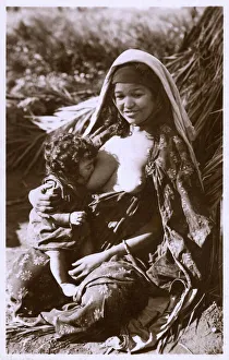 Young Algerian Mother breastfeeding her infant Young Algerian Mother breastfeeding her infant