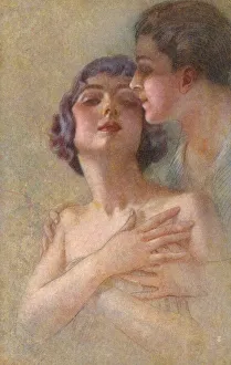 A young couple share a tender embrace A young couple share a tender embrace