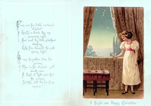 Young girl standing at a window on a Christmas card Young girl standing at a window on a Christmas card