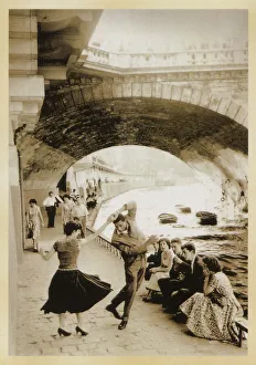 Young North Africans dancing on the Paris Quais Young North Africans dancing on the Paris Quais