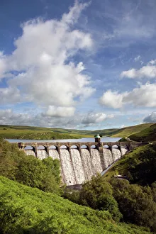 Craig Goch Dam - showing excess water flowing through the arches Craig Goch Dam - showing excess water flowing through the arches