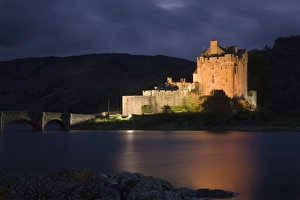 Eilean Donan Castle - being lit up at dusk - November Eilean Donan Castle - being lit up at dusk - November
