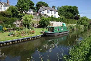 Green Canal Barge - moored on Grand Western Union Canal near Taunton Green Canal Barge - moored on Grand Western Union Canal near Taunton