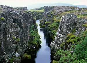 Iceland - crack in Earths crust at point where Tectonic plates join. mid-atlantic ridge Iceland - crack in Earths crust at point where Tectonic plates join. mid-atlantic ridge