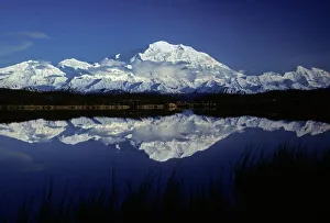 Mt. McKinley (Denali) from Reflection Pond, Denali National Park, Alaska, North America. June, late evening Mt. McKinley (Denali) from Reflection Pond, Denali National Park, Alaska, North America. June, late evening