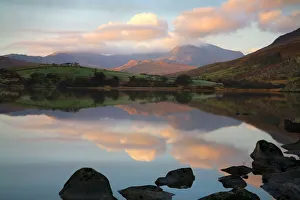 Snowdon at first light with a layer of cloud with reflections in Llynau Mymbya - November Snowdon at first light with a layer of cloud with reflections in Llynau Mymbya - November