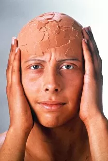 Images Dated 30th August 2002: Abstract image of a person with a cracked head