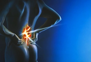 Artwork of man holding his lower back in pain Artwork of man holding his lower back in pain
