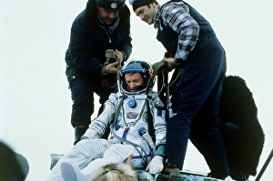 Astronaut J-L Chretien leaving TM-6 descent module Astronaut J-L Chretien leaving TM-6 descent module