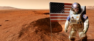 Astronaut on Mars with US flag, artwork Astronaut on Mars with US flag, artwork