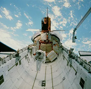 Astronaut van Hoften in Shuttle cargo bay, 41-C Astronaut van Hoften in Shuttle cargo bay, 41-C