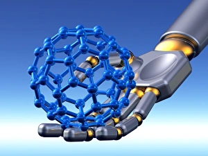Prints of Buckyball molecule being held by a robotic hand. Conceptual computer artwork that might represent research into, or hi-tech automated production of, buckyball molecules Images Dated 2009 February: Buckyball Molecule Print