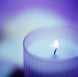 Images Dated 2003: Candle Burning in Glass Print