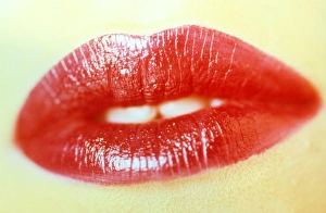 Close-up of the mouth of a woman wearing lipstick Close-up of the mouth of a woman wearing lipstick