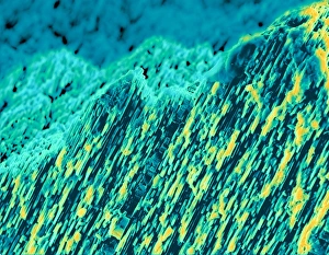 Coloured SEM of mother of pearl from oyster shell Coloured SEM of mother of pearl from oyster shell