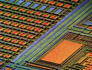 Coloured SEM of surface of an EPROM silicon chip Coloured SEM of surface of an EPROM silicon chip