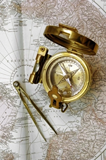 Navigation Tools Prints: Compass and dividers on a map