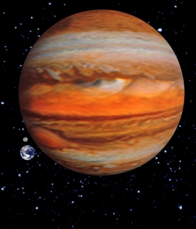 Computer artwork showing Jupiter and Earth sizes Computer artwork showing Jupiter and Earth sizes