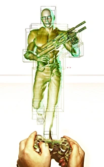 Prints of Computer game graphic. Conceptual computer artwork of a pair of hands using a computer console to control an armed computer game character Images Dated 2001 November: Computer Game Graphic Print