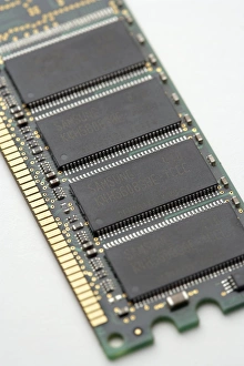 Prints of Computer memory chips. RAM (random access memory) chips (grey) on a circuit board from a computer Images Dated 2009 July: RAM Chips Print - Grey Memory Components on Circuit Board